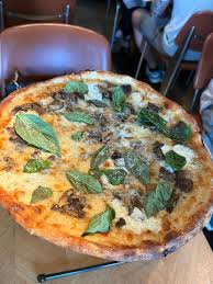 Heritage signature dishes Spicy Pork PizzaCacio e PepeShort Rib Lasagna